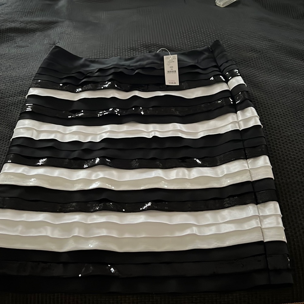 WHBM beautiful sequence skirt, perfect for work or for night out offers welcome